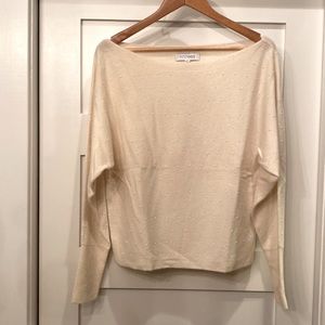 New off the shoulder ivory pearly sweater from Intermix. Size M